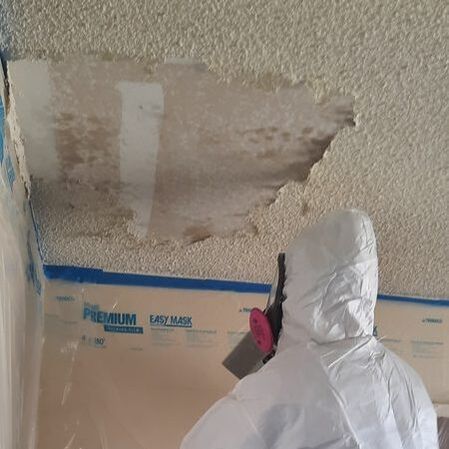 Hero 365's team providing certified mold and asbestos testing and remediation services in a residential/commercial building.